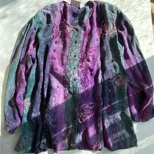 Colorful Blouse with beautiful artwork on the front .